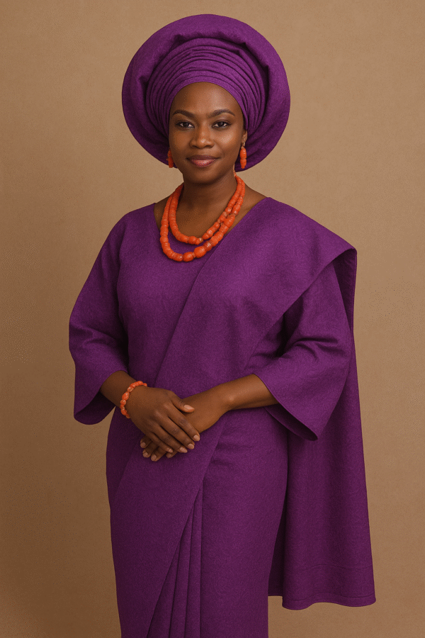 Purple Nigerian Traditional Attire with Gele and Coral Beads